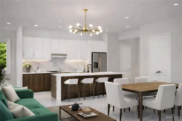 a view of a dining room with furniture a chandelier and wooden floor