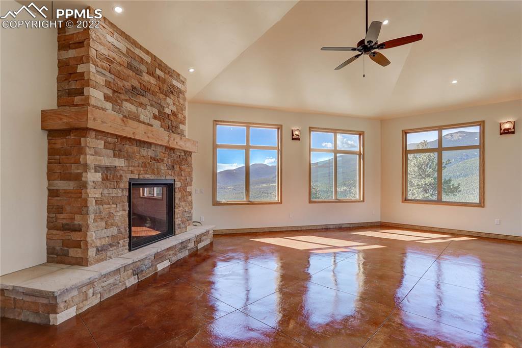 56801 US Highway 285 Bailey, CO 80421 - Photo 11 of 29 a living room with fireplace furniture and a window