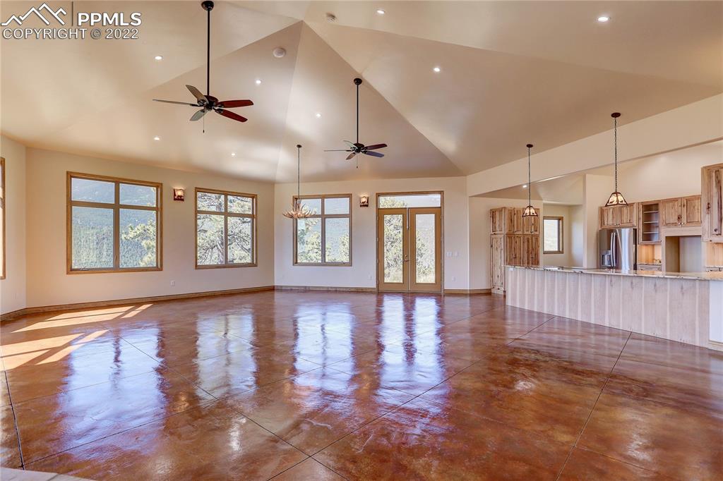 56801 US Highway 285 Bailey, CO 80421 - Photo 14 of 29 a view of an empty room with wooden floor and a window