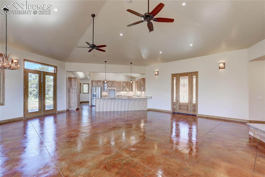 56801 US Highway 285 Bailey, CO 80421 - Photo 15 of 29 a view of empty room with wooden floor and fan