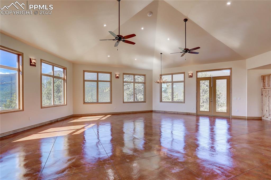 56801 US Highway 285 Bailey, CO 80421 - Photo 19 of 29 a view of an empty room with wooden floor and a window