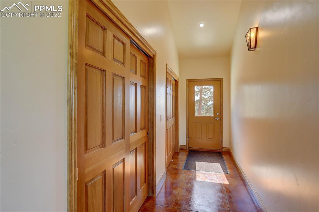 56801 US Highway 285 Bailey, CO 80421 - Photo 26 of 29 a view of a hallway with wooden floor