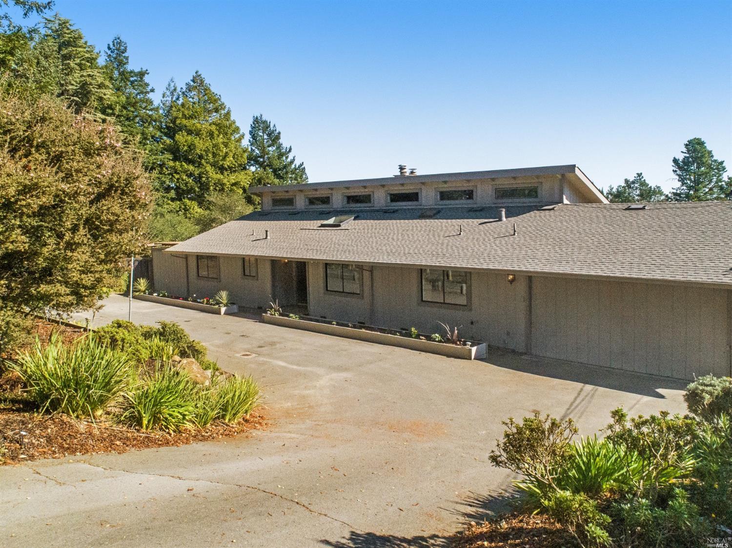 1065 Tilton Road Sebastopol, CA 95472 - Photo 1 of 1 a front view of a house with a yard