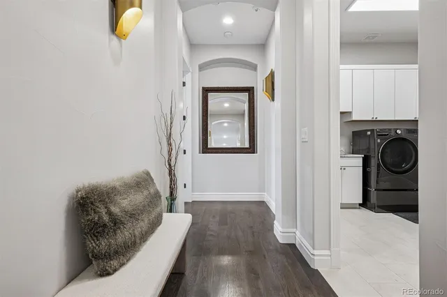 a bedroom with bed and a table