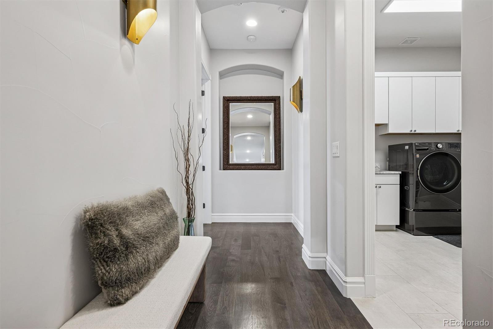 337 High Ridge Way Castle Pines, CO 80108 - Photo 22 of 50 a hallway with a washer and dryer