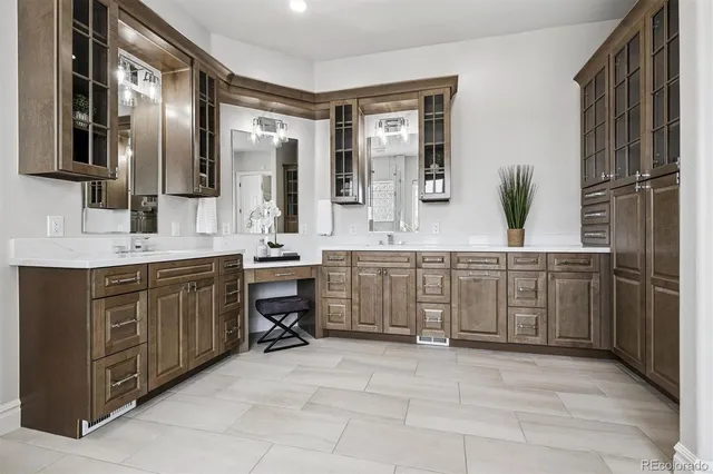 a view of cabinets and wooden floor