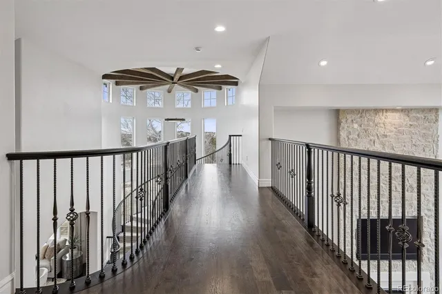 a kitchen with stainless steel appliances granite countertop a stove and a refrigerator