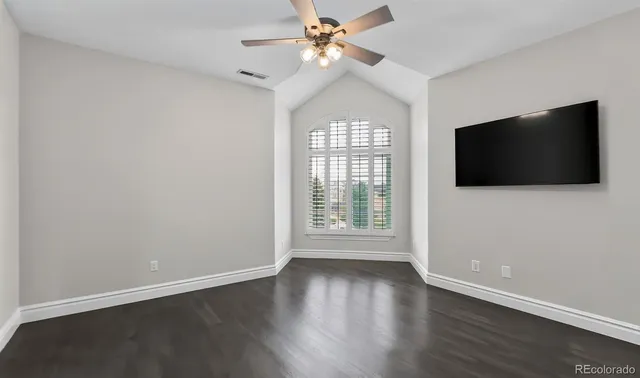 a bathroom with a double vanity sink toilet and shower