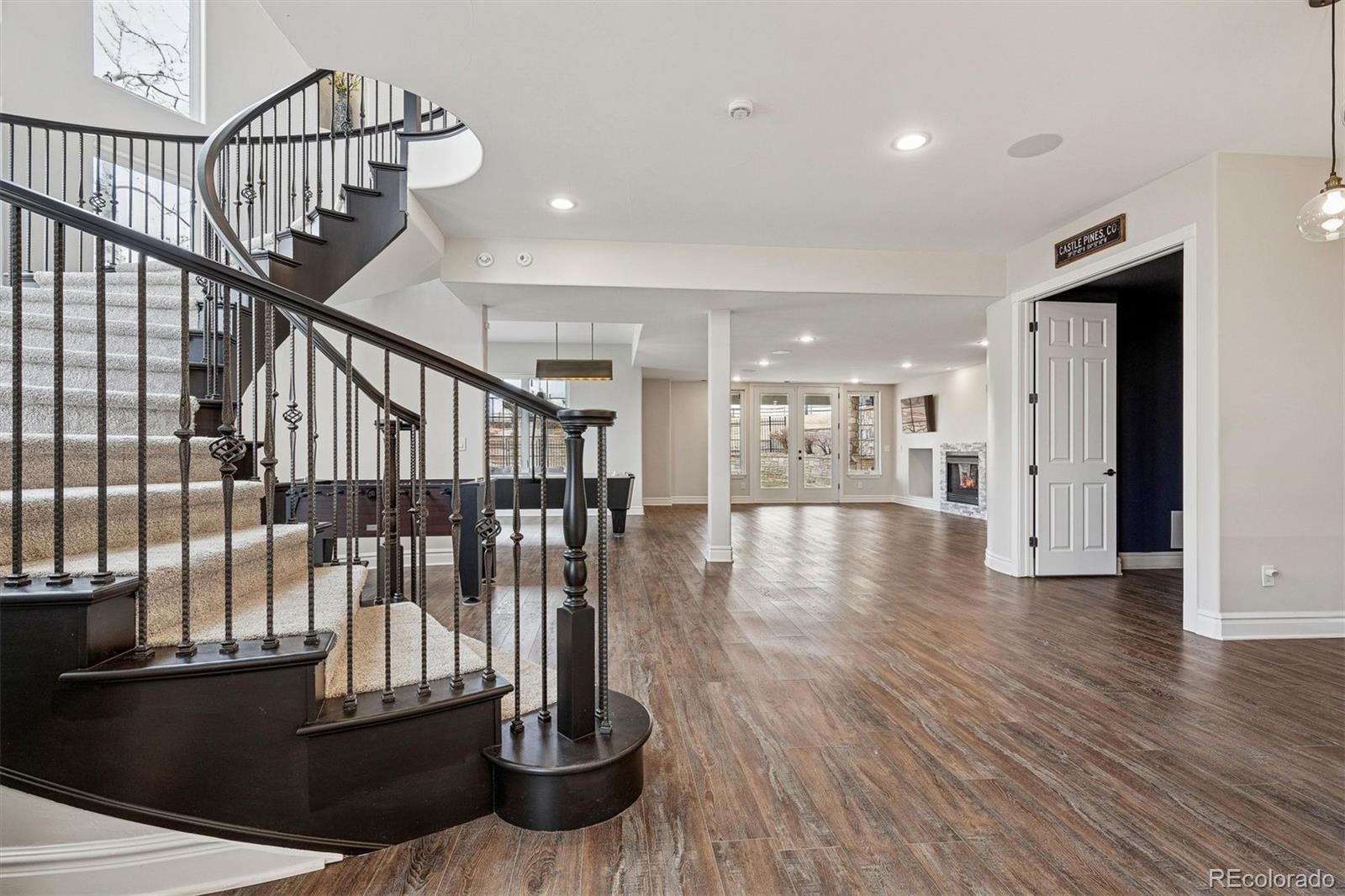 337 High Ridge Way Castle Pines, CO 80108 - Photo 39 of 50 a view of entryway with wooden floor