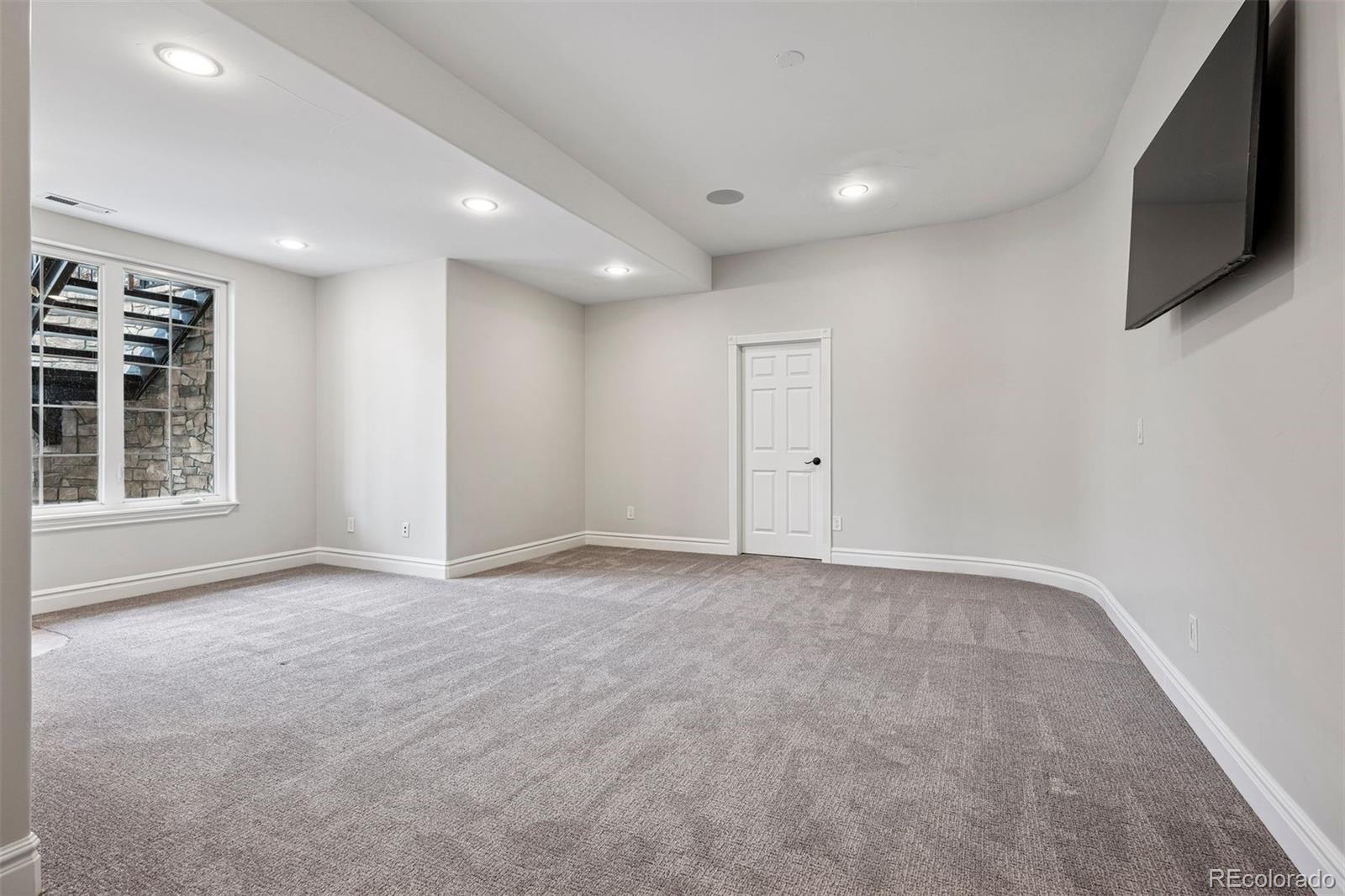 337 High Ridge Way Castle Pines, CO 80108 - Photo 45 of 50 a view of an empty room with a window