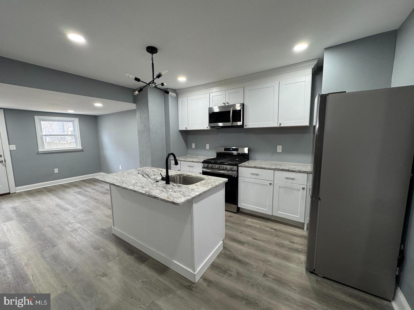 316 Clements Bridge Road Barrington, NJ 08007 - Photo 22 of 36 Modern kitchen with sleek finishes.