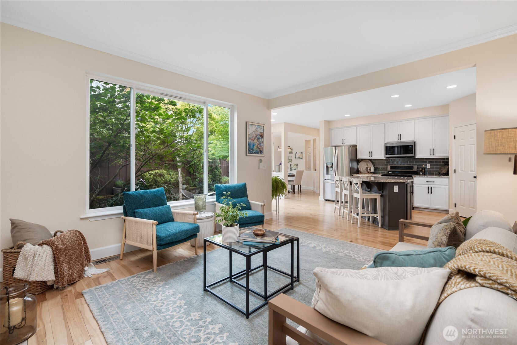 21104 1st Avenue West Bothell, WA 98021 - Photo 16 of 34 a living room with furniture and a view of kitchen