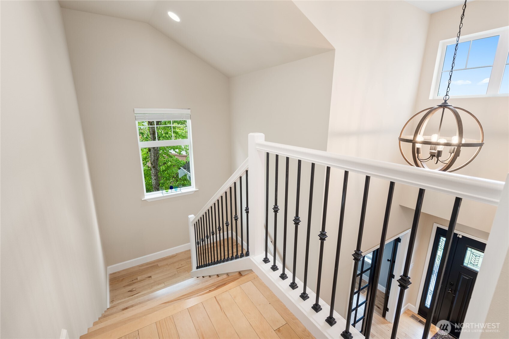 21104 1st Avenue West Bothell, WA 98021 - Photo 19 of 34 a view of a livingroom with wooden floor and a window