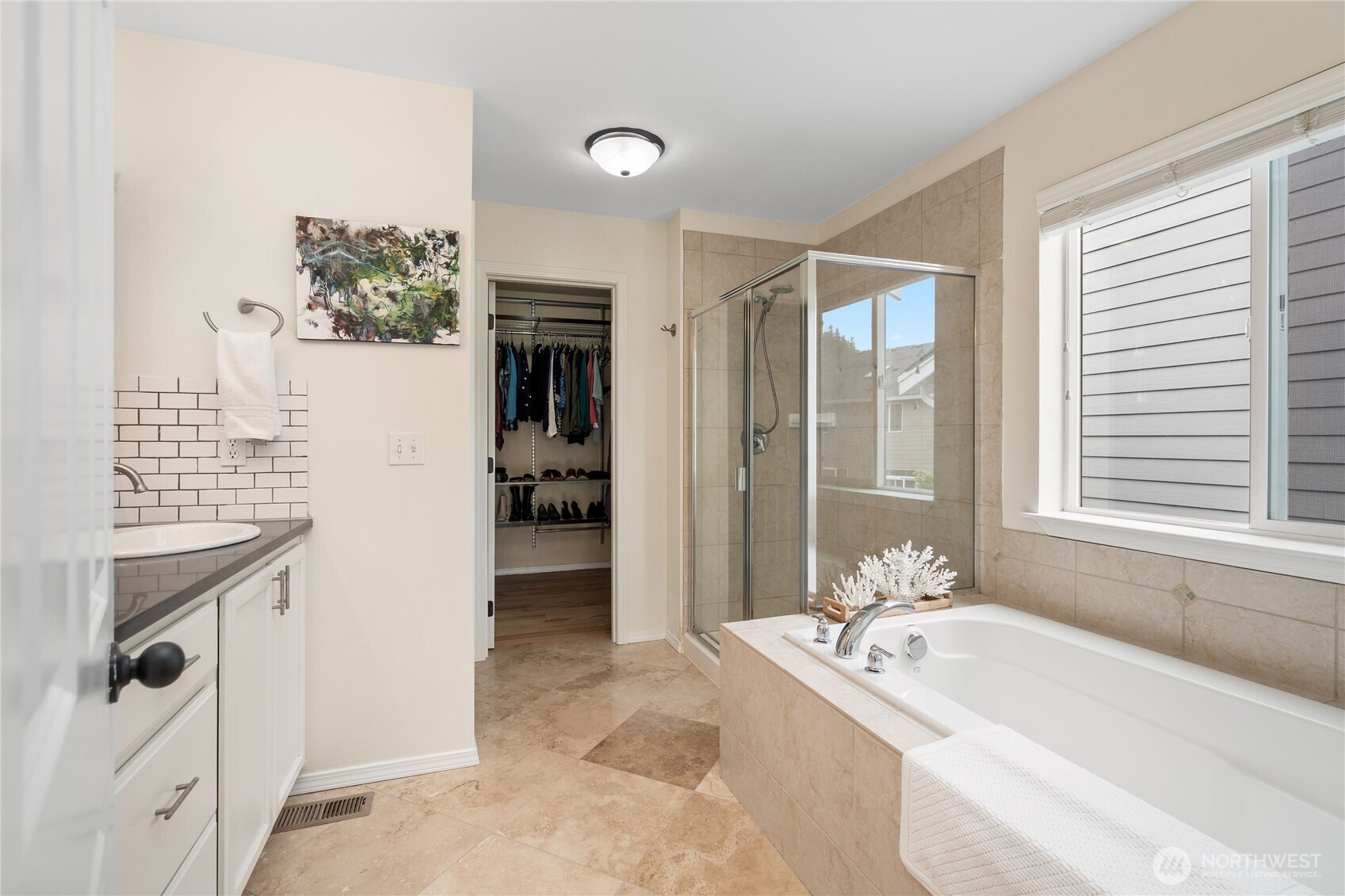 21104 1st Avenue West Bothell, WA 98021 - Photo 21 of 34 a spacious bathroom with a tub sink shower and mirror
