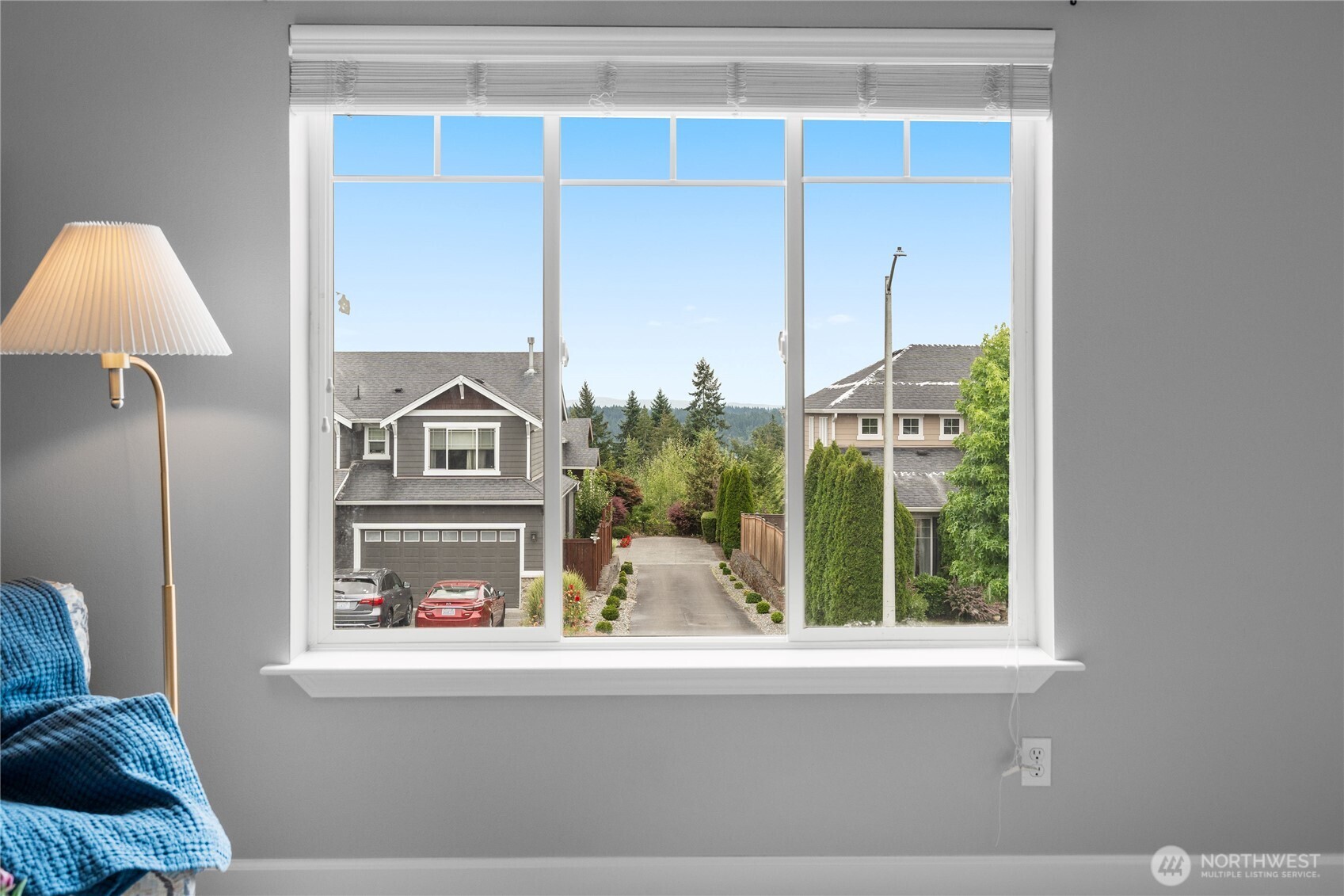 21104 1st Avenue West Bothell, WA 98021 - Photo 25 of 34 a view of living room with a bed furniture and a window