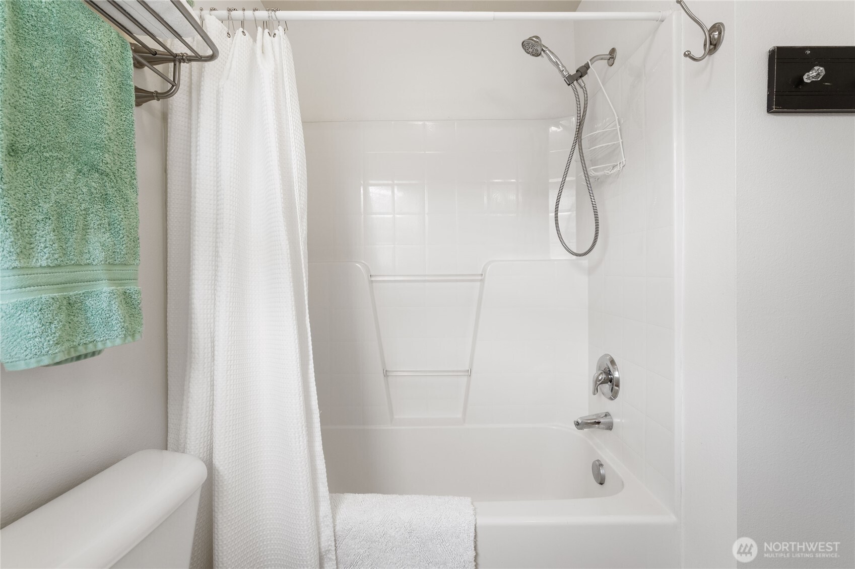 21104 1st Avenue West Bothell, WA 98021 - Photo 30 of 34 a bathroom with a shower and a bath tub