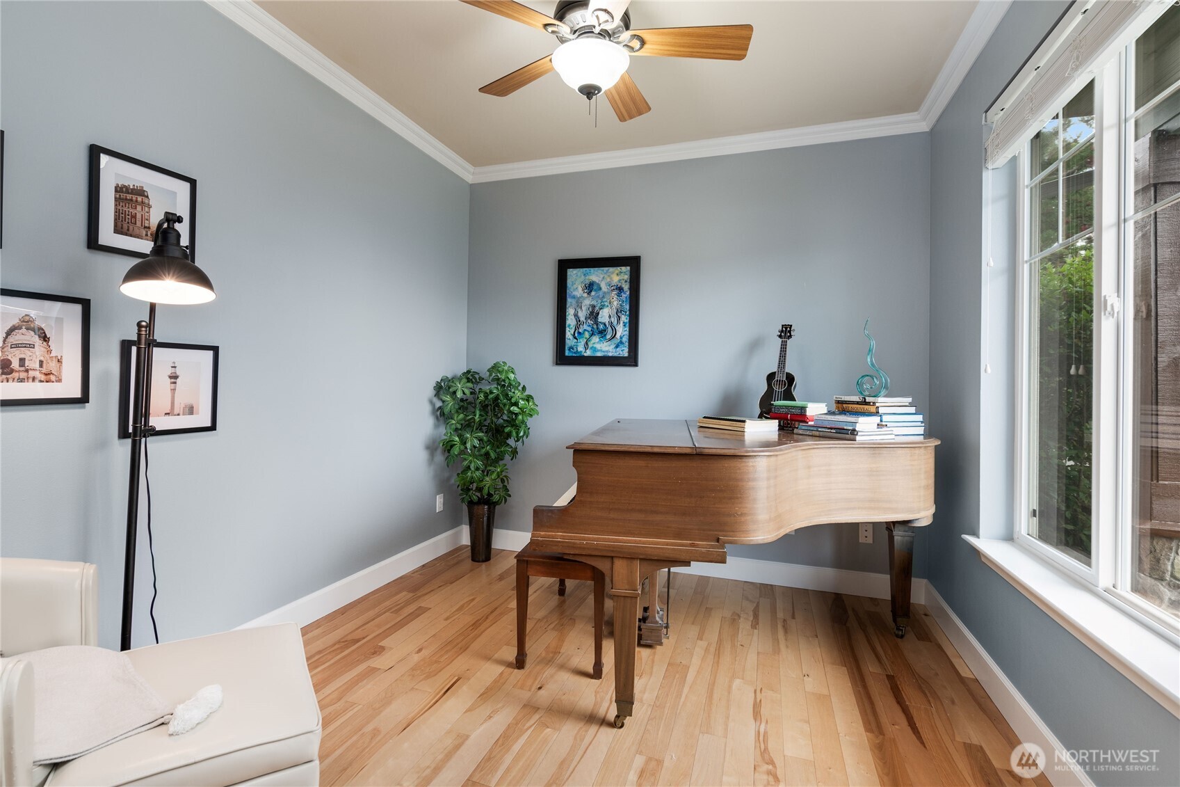 21104 1st Avenue West Bothell, WA 98021 - Photo 6 of 34 a view of a dining room with furniture window and wooden floor