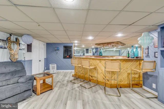 a view of kitchen with furniture and wooden floor
