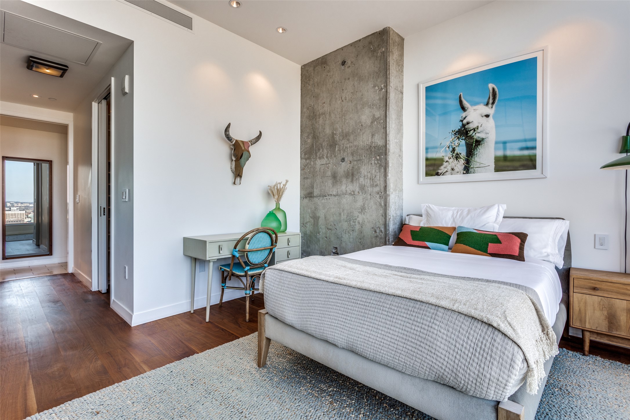 210 Lavaca Street, Unit 3305 Austin, TX 78701 - Photo 9 of 24 Bedroom featuring dark wood-style floors and baseboards