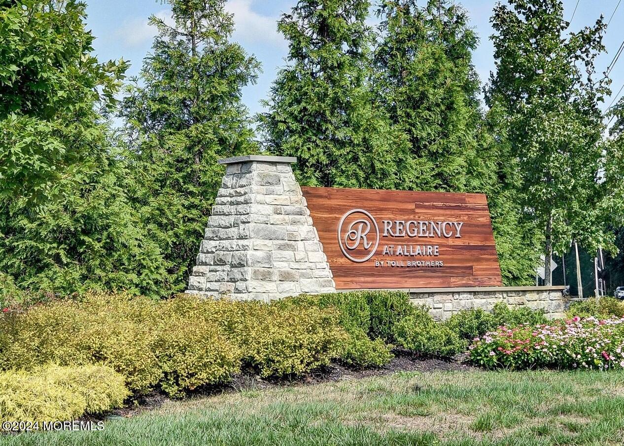 166 Grandview Circle Howell, NJ 07731 - Photo 29 of 48 a sign that is sitting on a brick wall