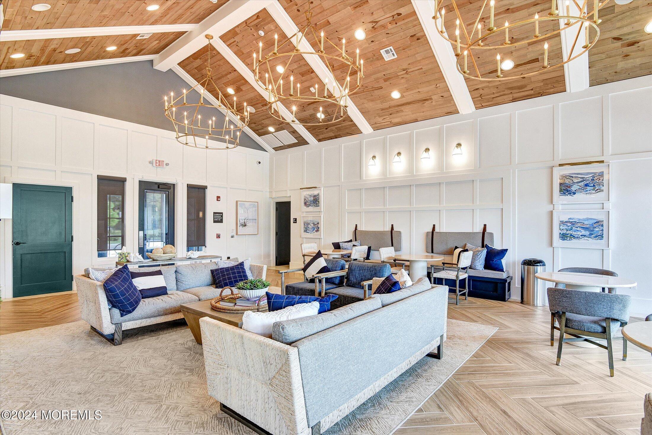 166 Grandview Circle Howell, NJ 07731 - Photo 35 of 48 a living room with furniture and a chandelier