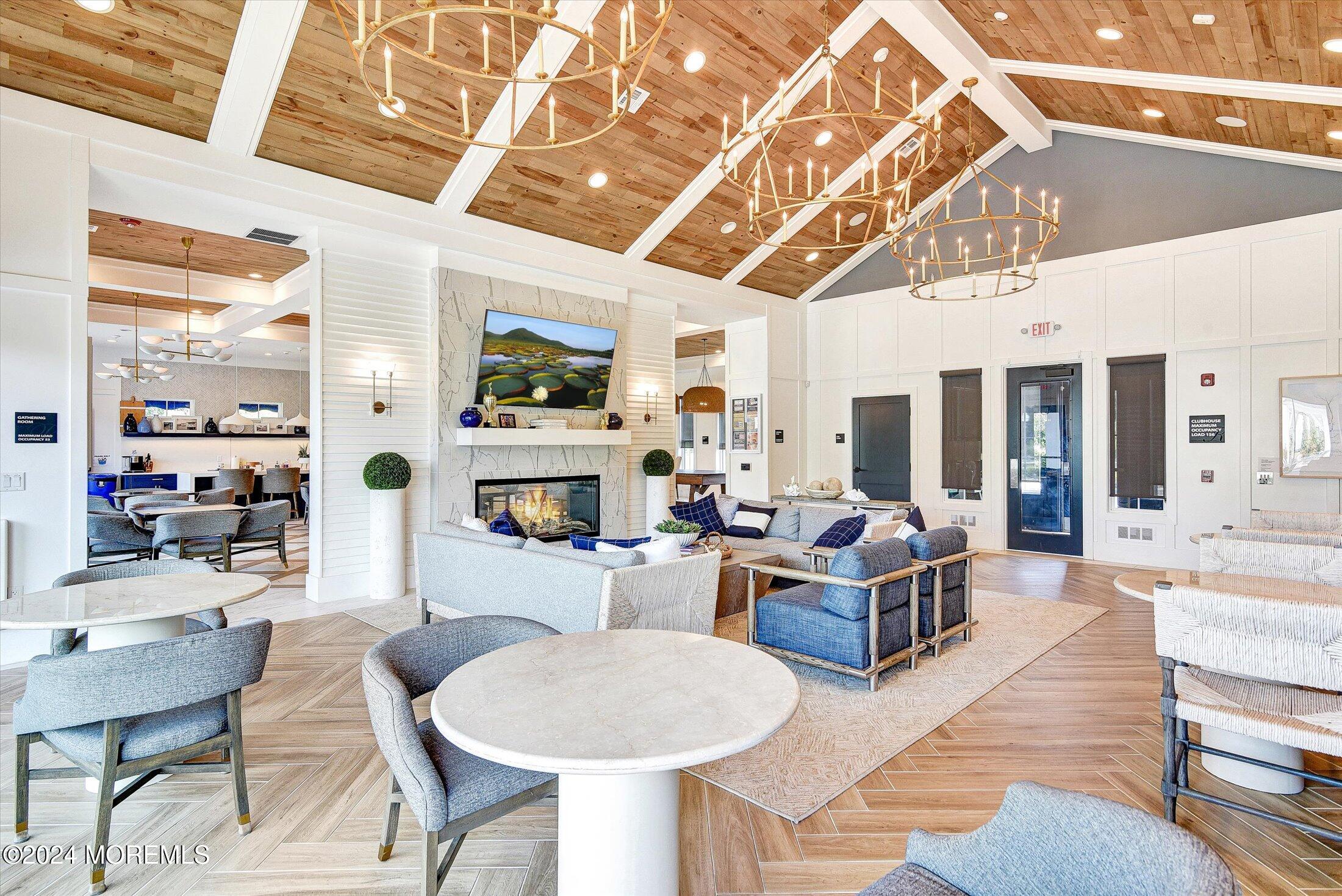 166 Grandview Circle Howell, NJ 07731 - Photo 36 of 48 a living room with fireplace furniture and a flat screen tv