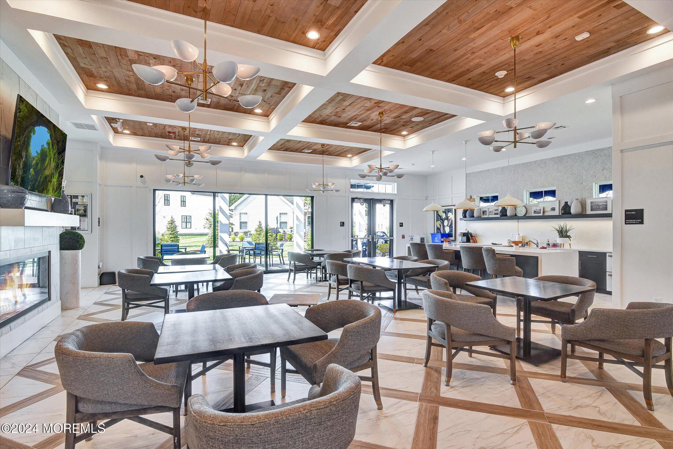 166 Grandview Circle Howell, NJ 07731 - Photo 39 of 48 a living room with lots of furniture a fireplace and a flat screen tv