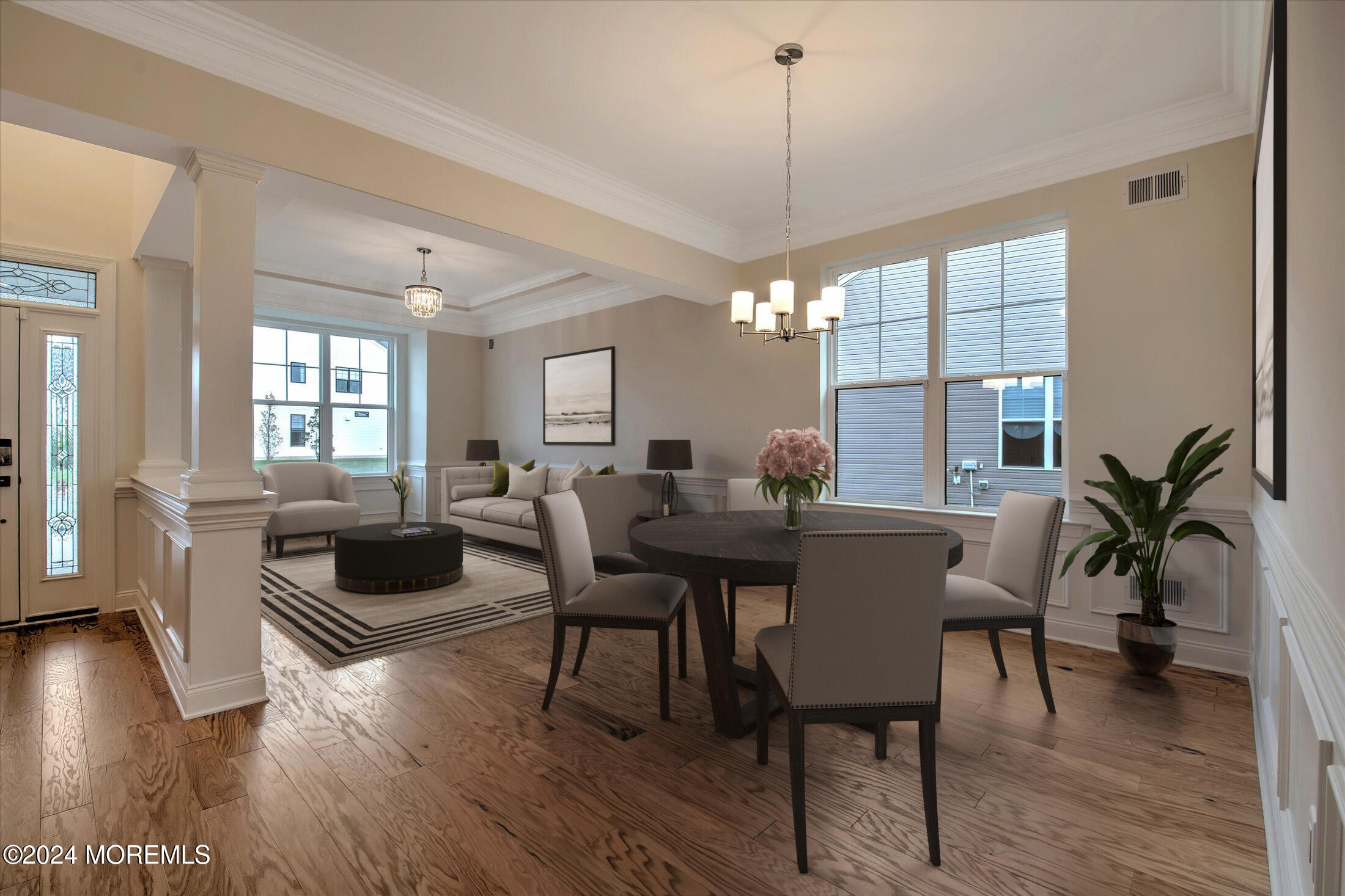 166 Grandview Circle Howell, NJ 07731 - Photo 4 of 48 a view of a dining room and livingroom with furniture wooden floor a chandelier