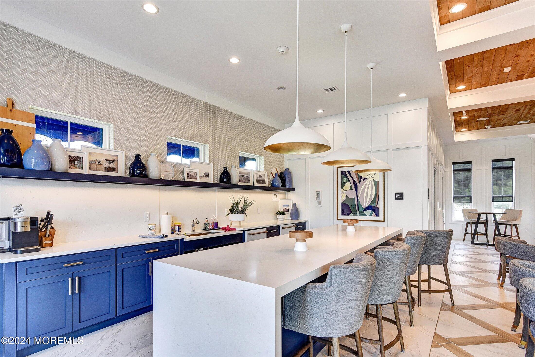 166 Grandview Circle Howell, NJ 07731 - Photo 41 of 48 a kitchen with stainless steel appliances kitchen island granite countertop a sink and cabinets