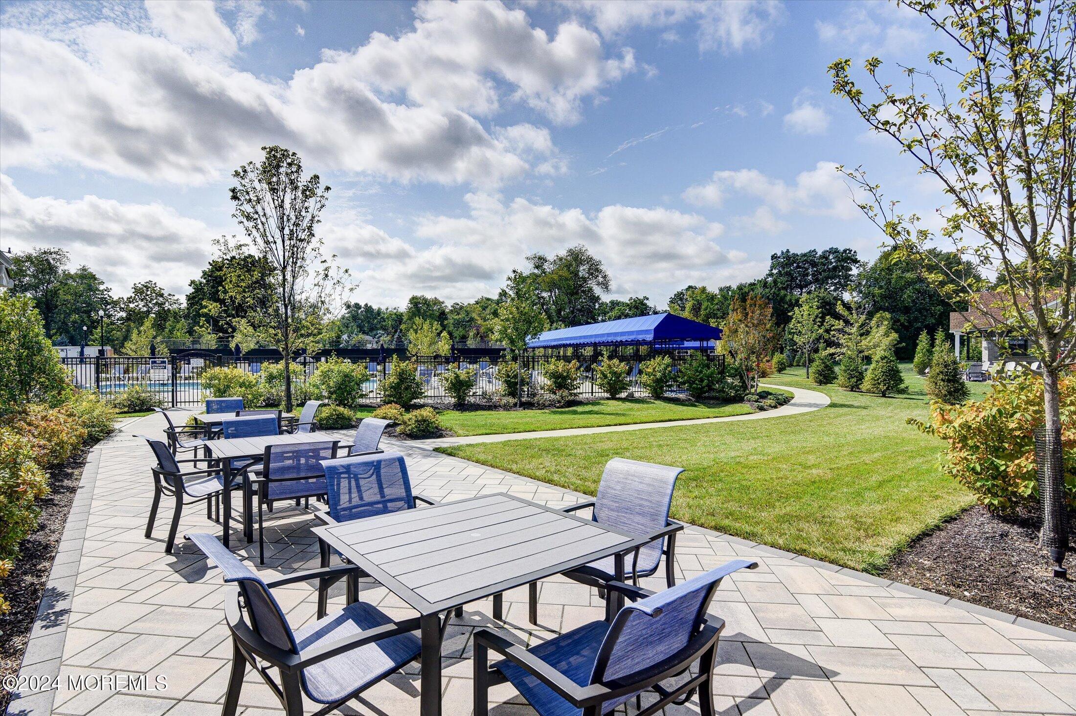 166 Grandview Circle Howell, NJ 07731 - Photo 45 of 48 a view of a chairs and table in the garden