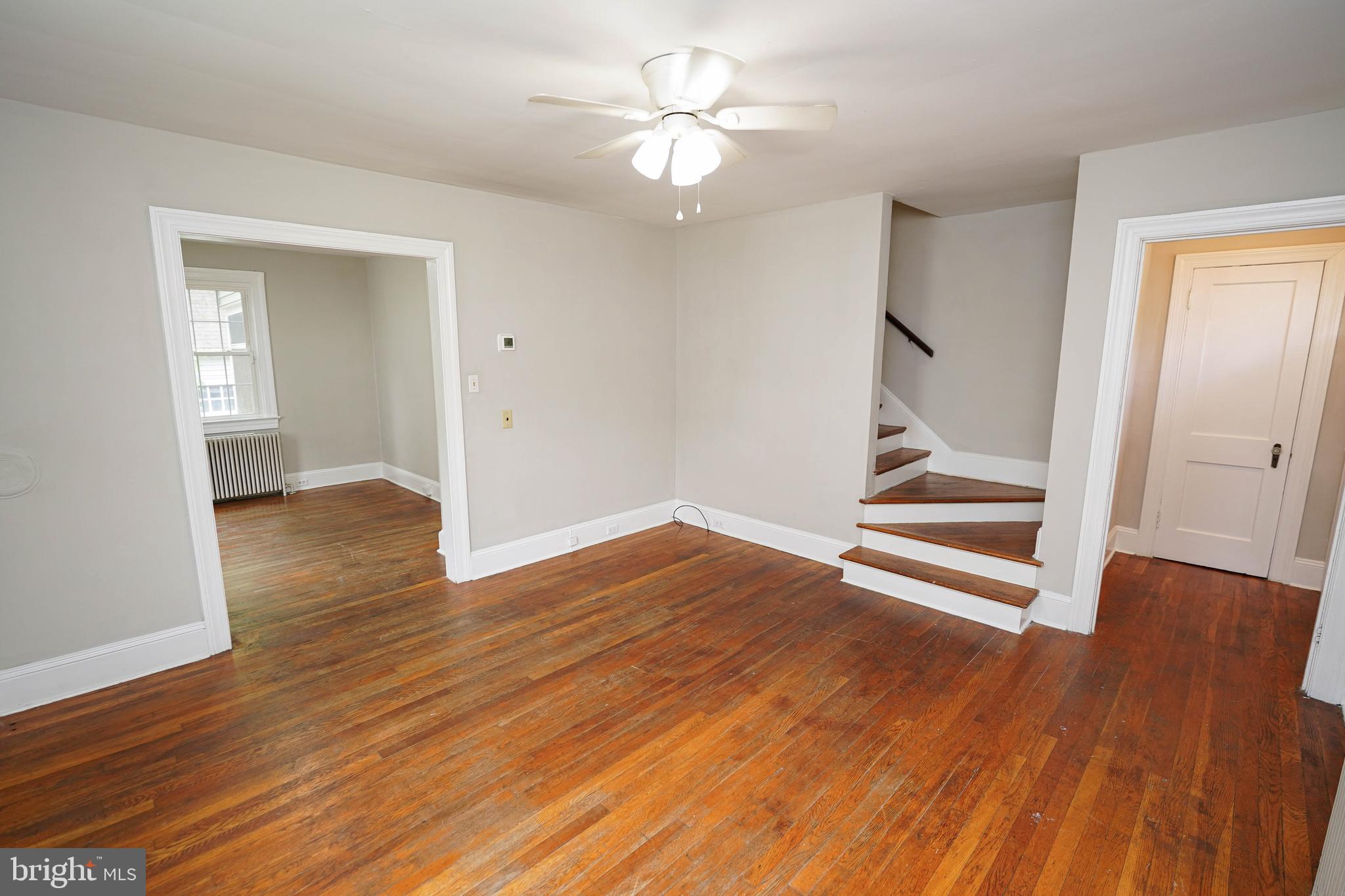 234 North Boulevard, Unit A Salisbury, MD 21801 - Photo 11 of 38 wooden floor in an empty room with a window