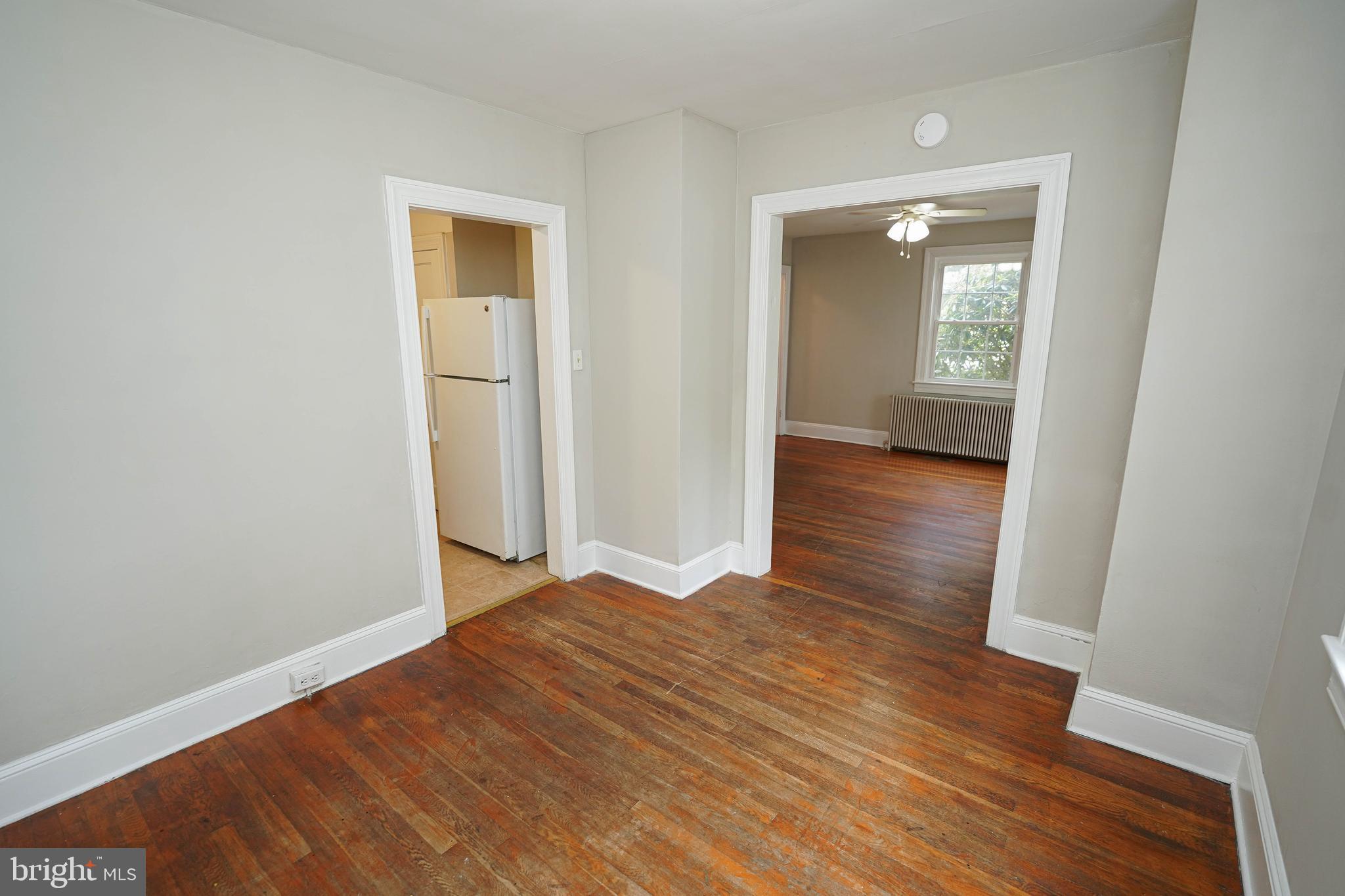 234 North Boulevard, Unit A Salisbury, MD 21801 - Photo 14 of 38 a view of a room with wooden floor and a sink