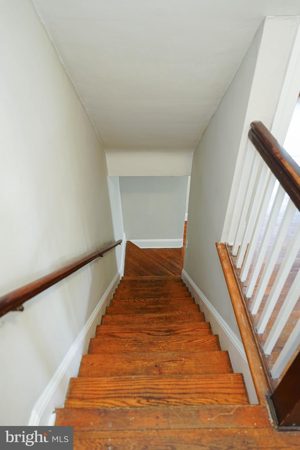 234 North Boulevard, Unit A Salisbury, MD 21801 - Photo 22 of 38 a view of a room with wooden floor and stairs