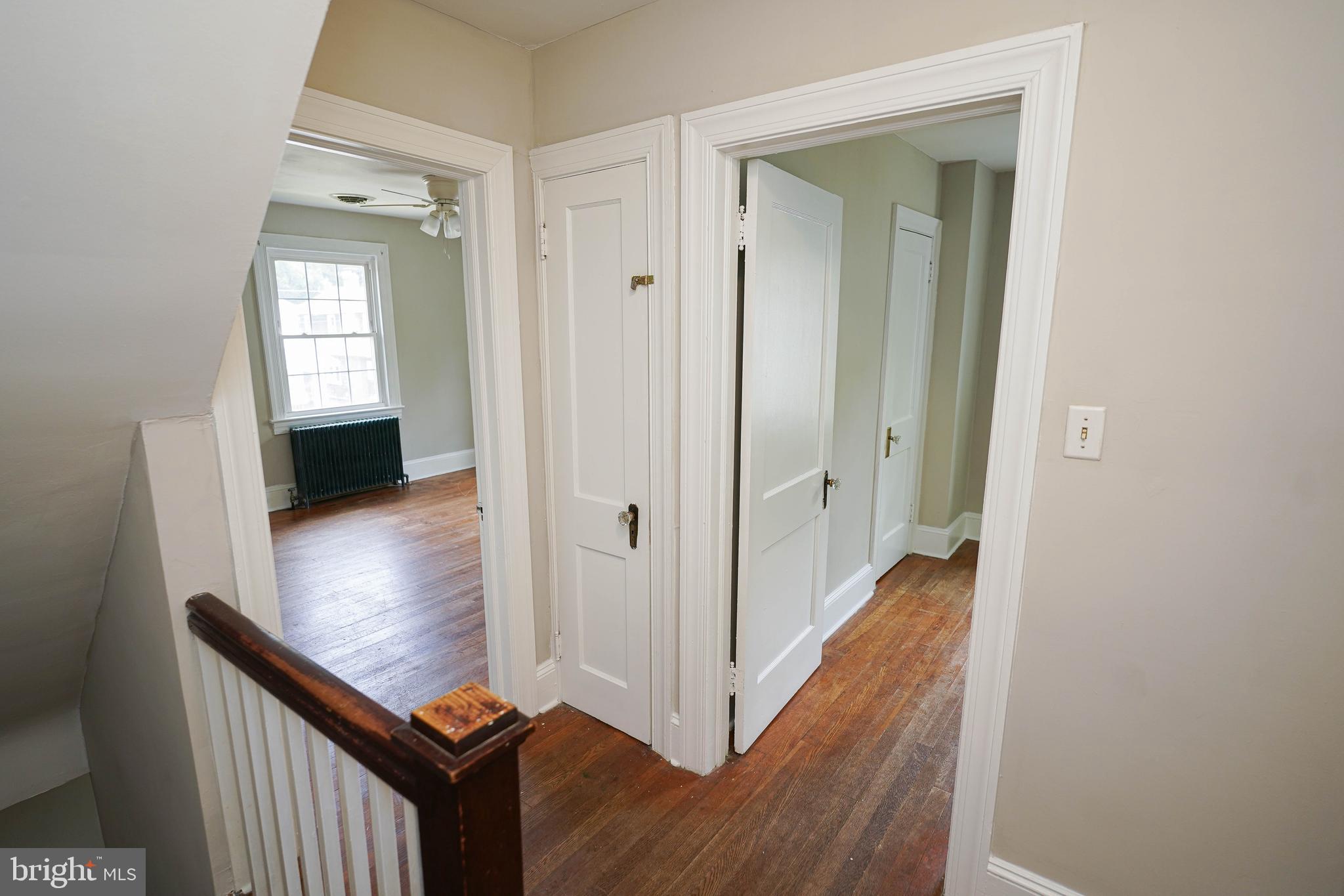 234 North Boulevard, Unit A Salisbury, MD 21801 - Photo 23 of 38 a view of a hallway with wooden floor and stairs