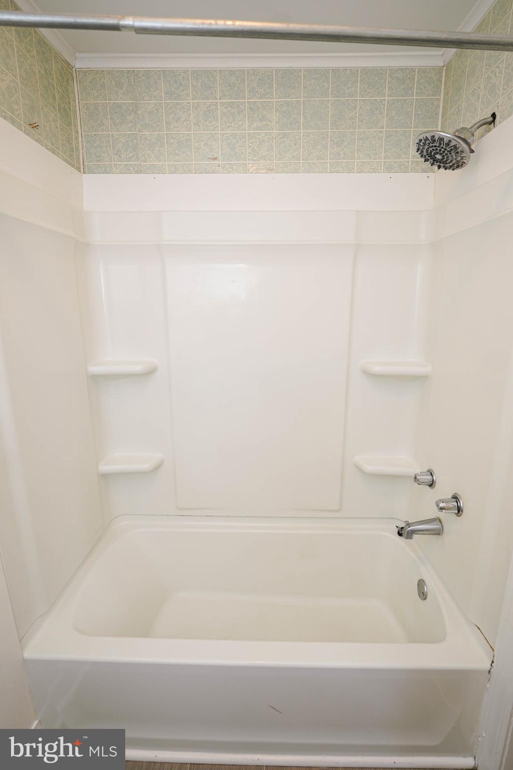 234 North Boulevard, Unit A Salisbury, MD 21801 - Photo 38 of 38 a bathroom with a bathtub