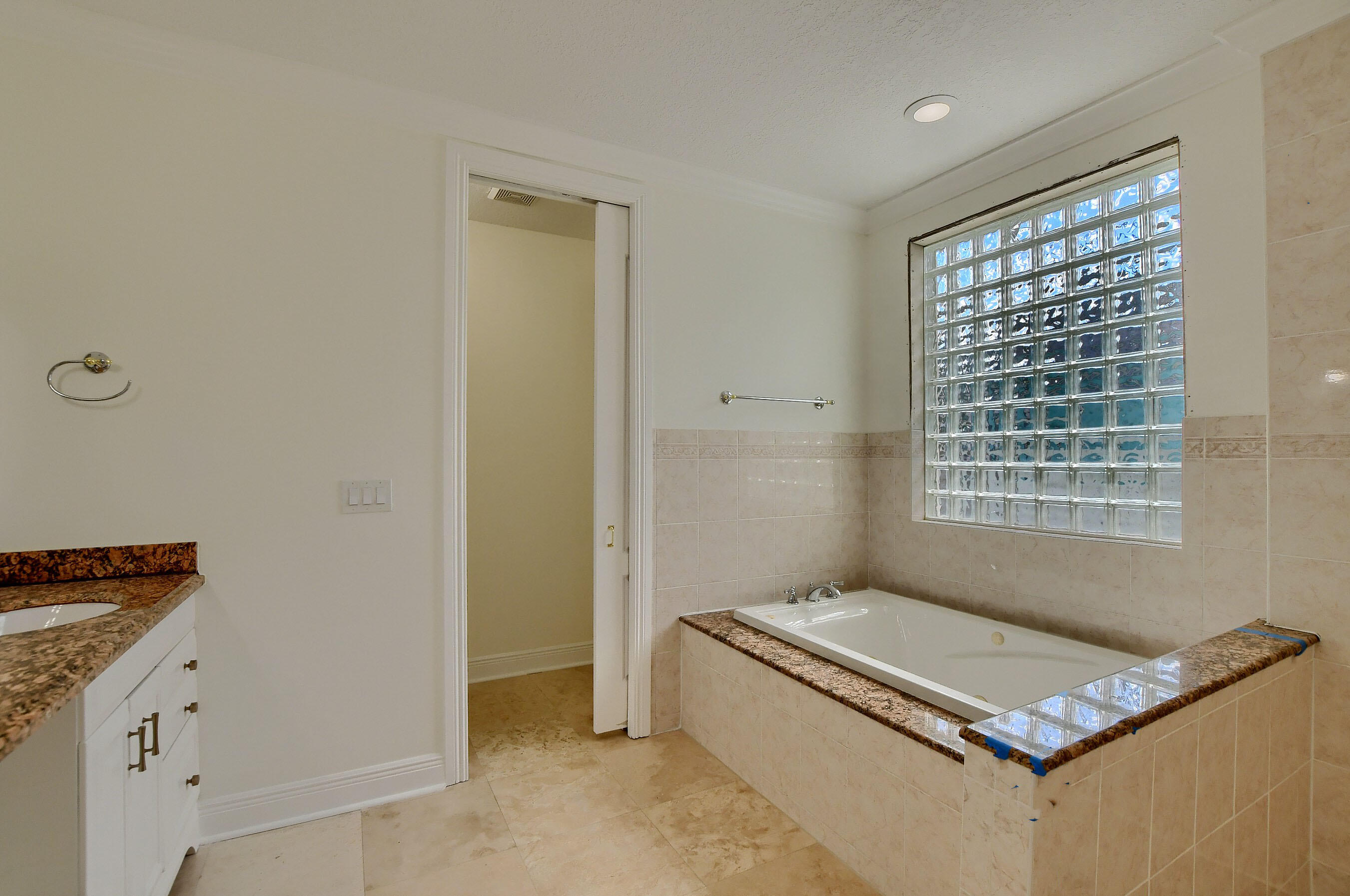 9058 Southwest 4th Street Boca Raton, FL 33433 - Photo 25 of 53 a living room with hard wood floor and a window