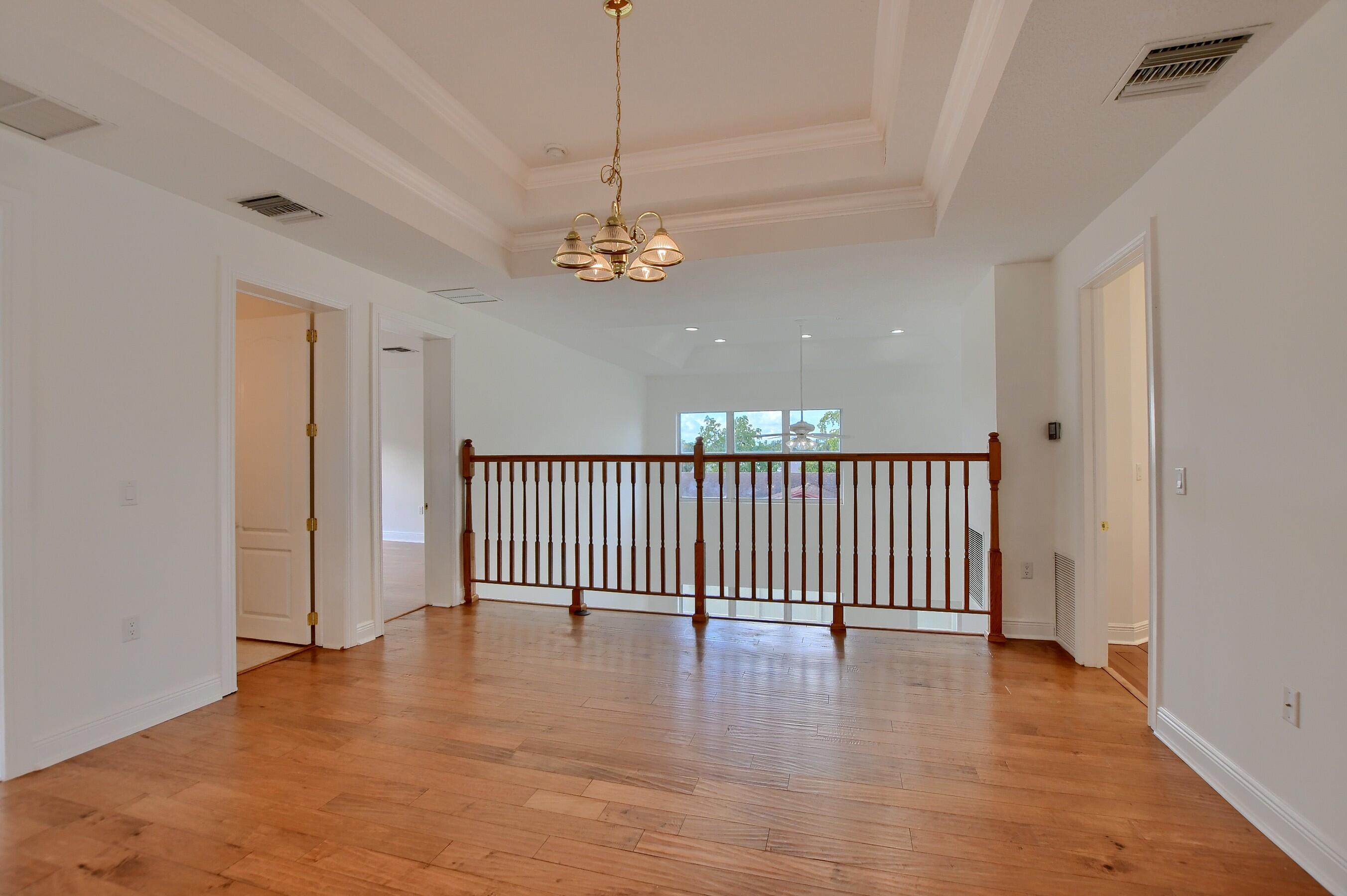 9058 Southwest 4th Street Boca Raton, FL 33433 - Photo 29 of 53 en view interior of a house with wooden floor and fence