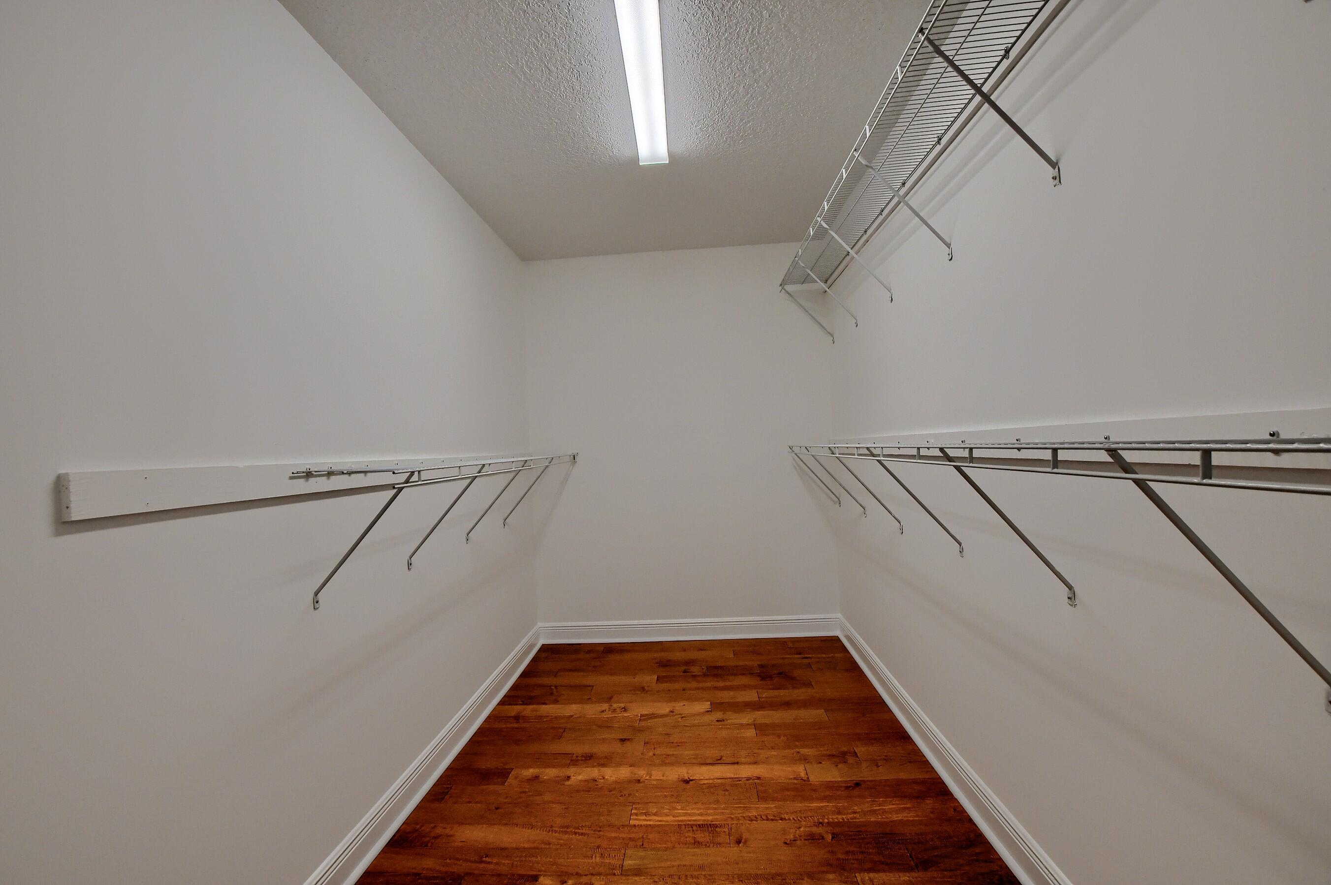 9058 Southwest 4th Street Boca Raton, FL 33433 - Photo 35 of 53 a view of a room with racks on the wall