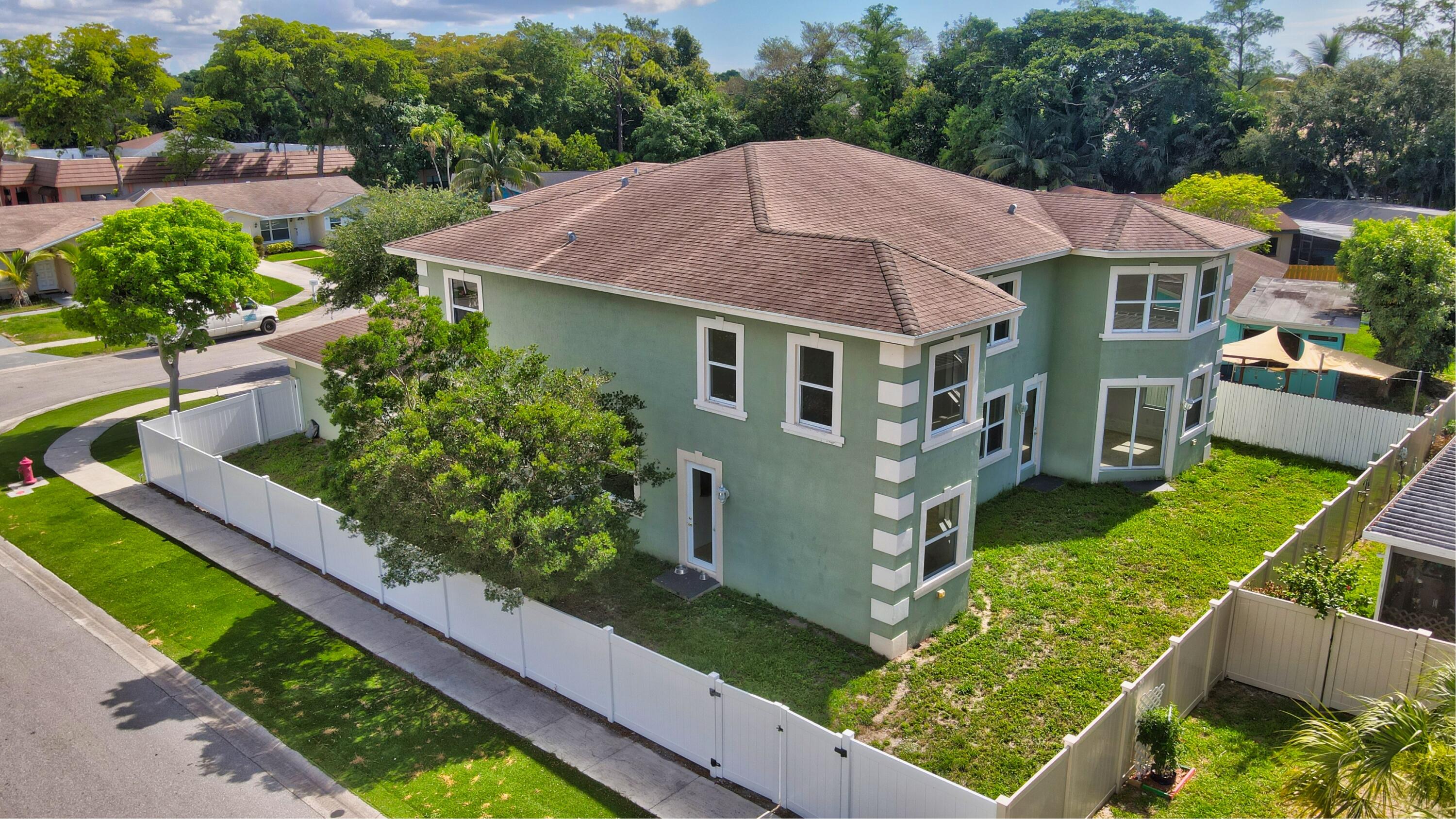 9058 Southwest 4th Street Boca Raton, FL 33433 - Photo 52 of 53 a aerial view of a house with garden