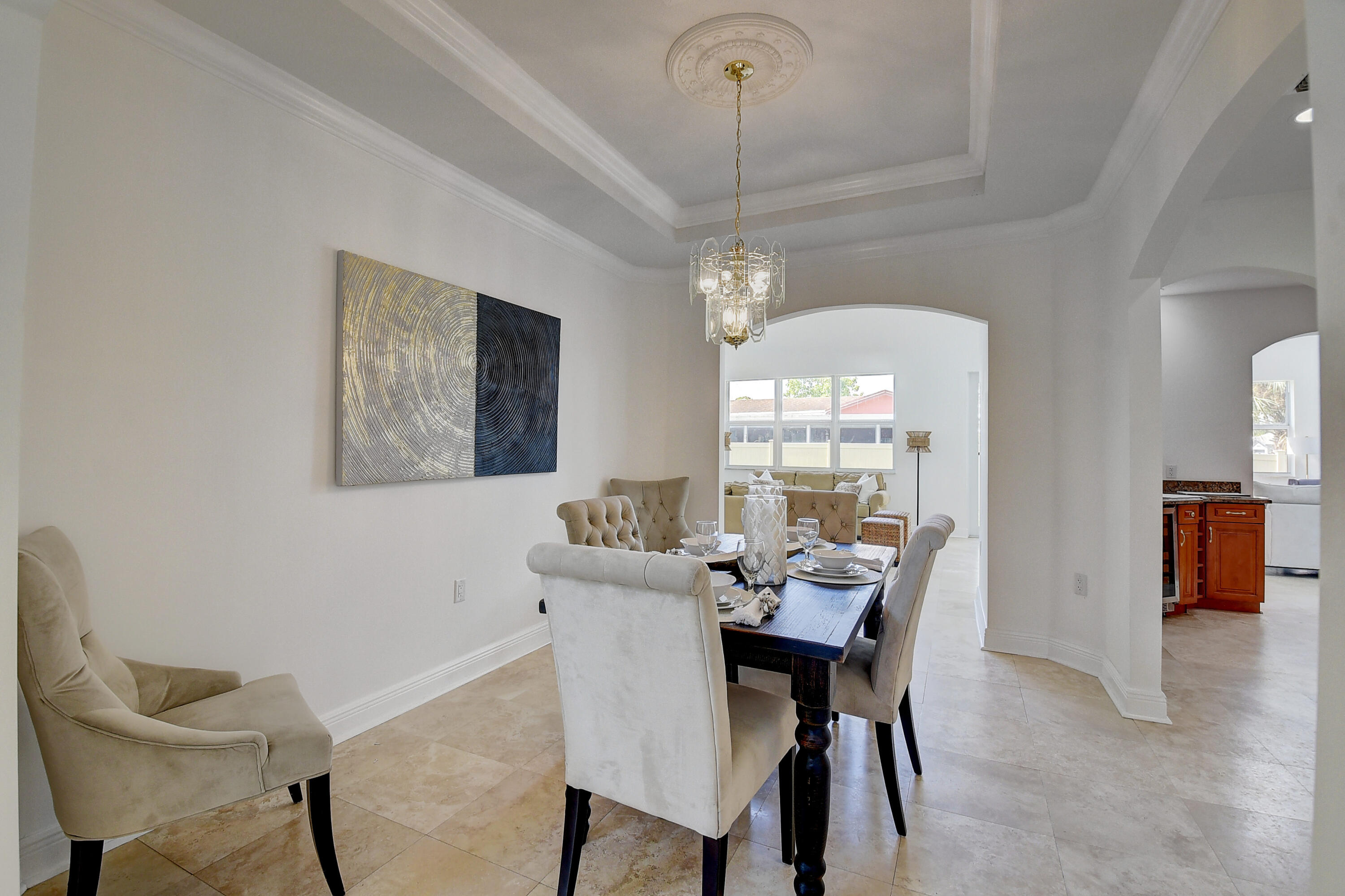 9058 Southwest 4th Street Boca Raton, FL 33433 - Photo 6 of 53 a view of a dining room with furniture window and outside view
