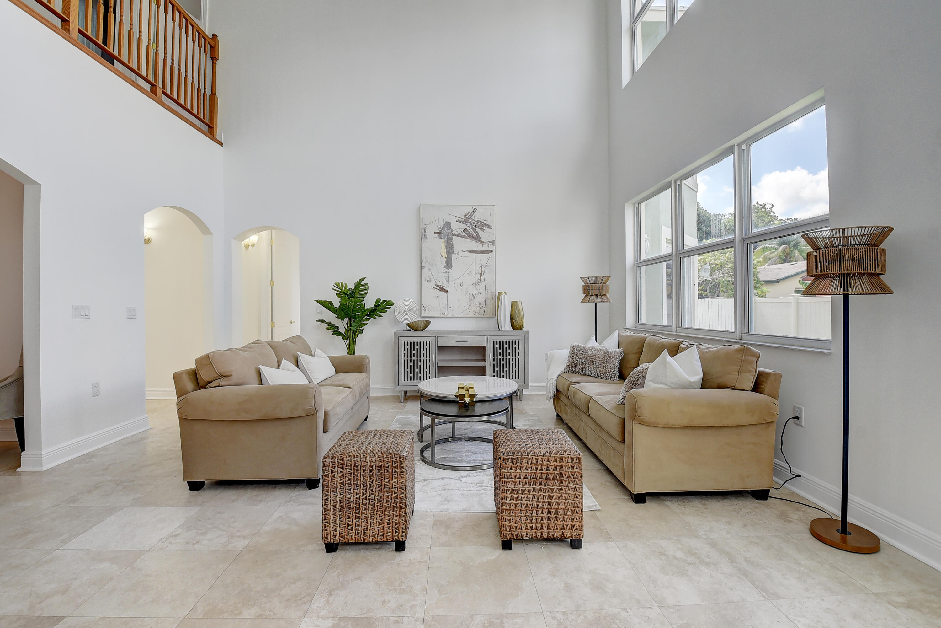 9058 Southwest 4th Street Boca Raton, FL 33433 - Photo 10 of 53 a living room with furniture and a large window
