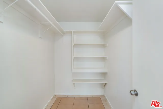 a kitchen with a granite countertop sink