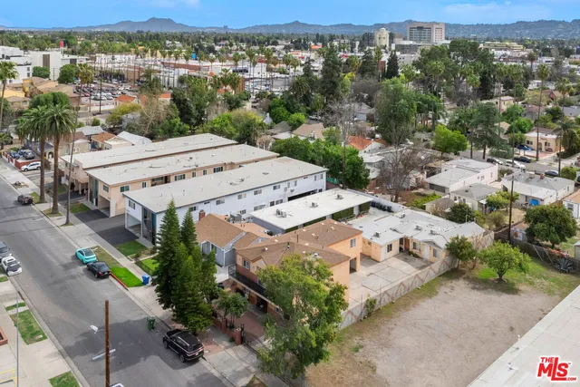 an aerial view of a city with lots of residential buildings