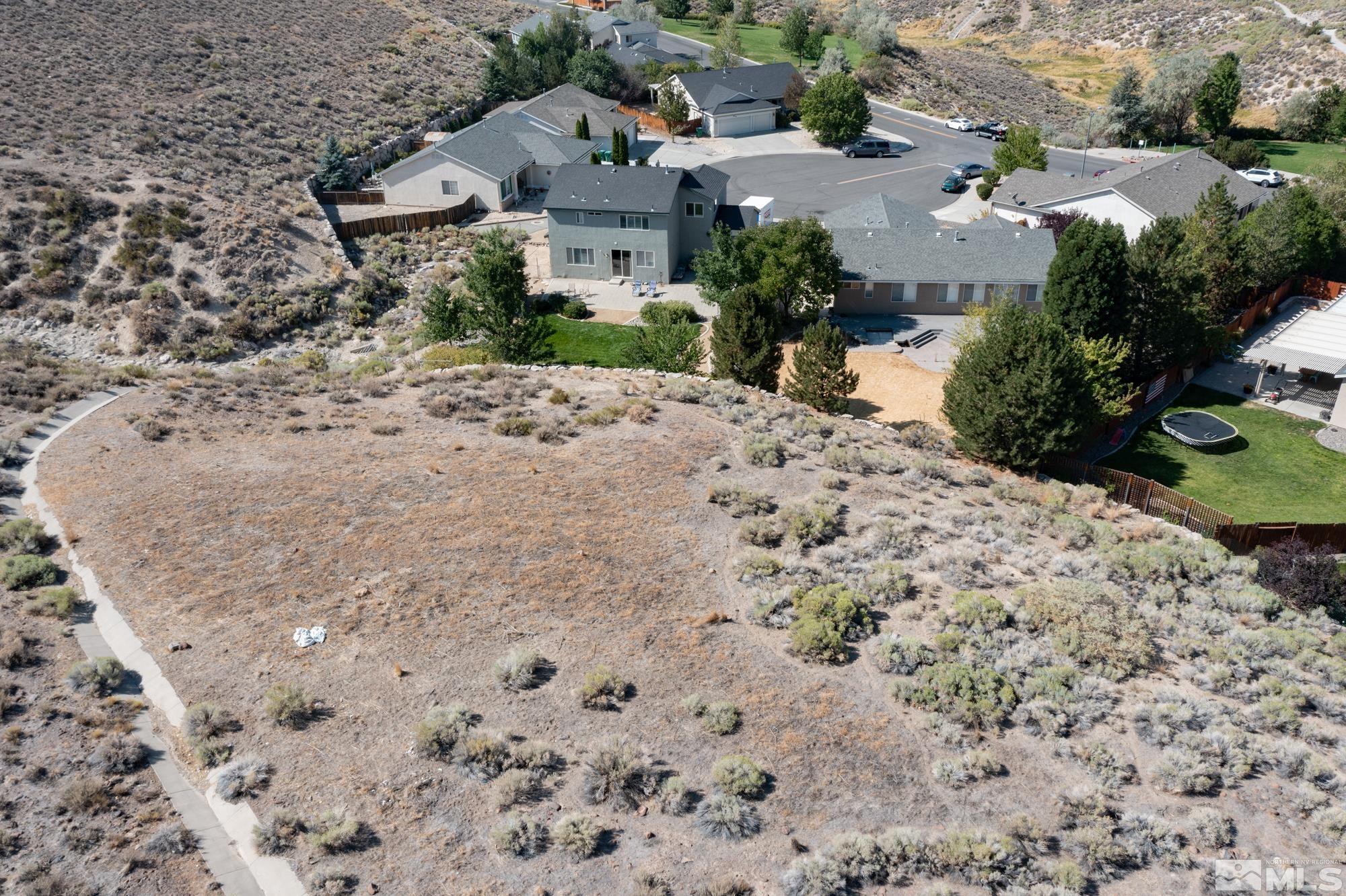 5459 Zeppelin Court Reno, NV 89523 - Photo 34 of 36 an aerial view of a house with a yard
