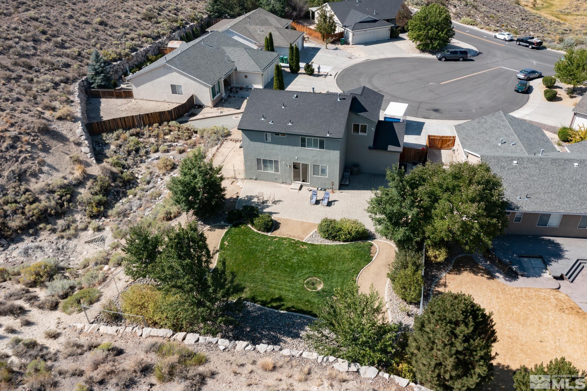 5459 Zeppelin Court Reno, NV 89523 - Photo 35 of 36 an aerial view of a house with a yard basket ball court and outdoor seating