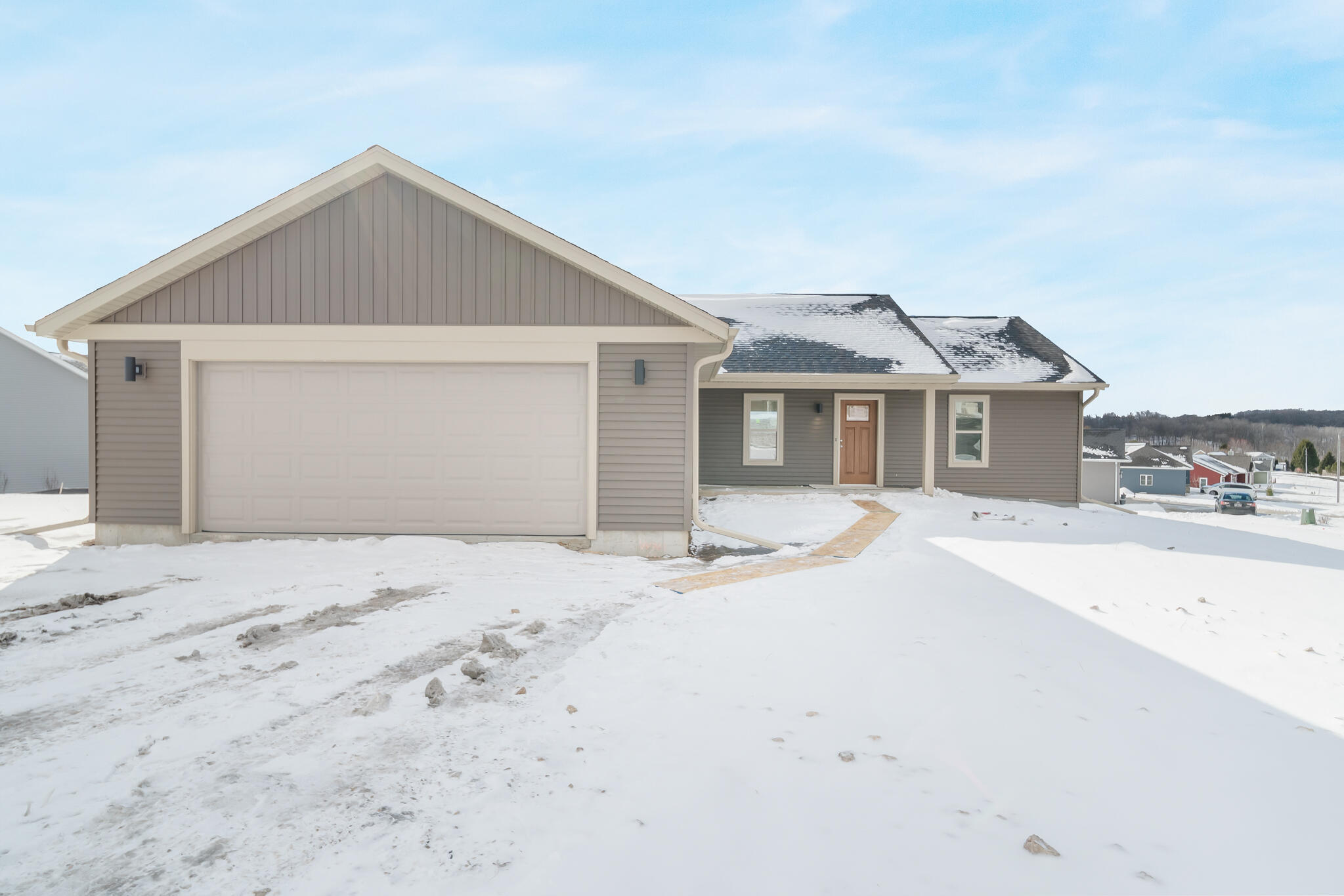 627 Bobolink Lane Cascade, WI 53011 - Photo 33 of 39 2 Car Attached Garage