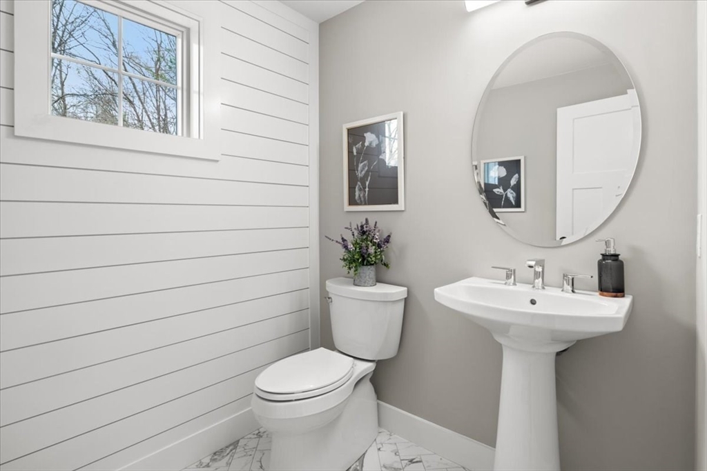 24 Jayne Road Needham, MA 02494 - Photo 12 of 34 a bathroom with a toilet sink and mirror