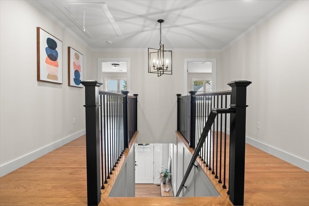 24 Jayne Road Needham, MA 02494 - Photo 14 of 34 a view of entryway and hall with wooden floor