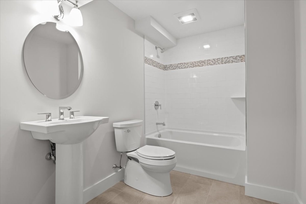 24 Jayne Road Needham, MA 02494 - Photo 24 of 34 a bathroom with a sink toilet and shower