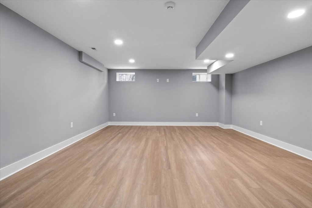 24 Jayne Road Needham, MA 02494 - Photo 26 of 34 a view of empty room with wooden floor
